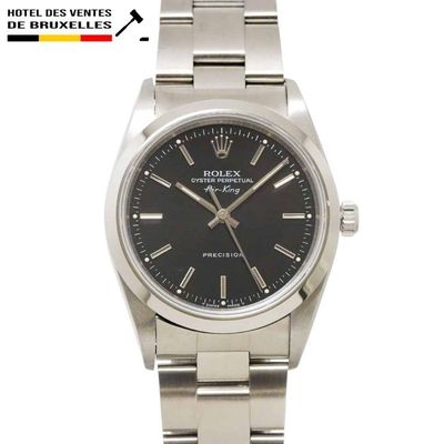Montre Rolex Day-Date en acier inoxydable, avec cadran noir et chiffres romains