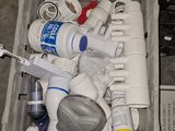 a box full of assorted items sitting on the floor