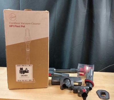 a box that has some type of vacuum cleaner in it