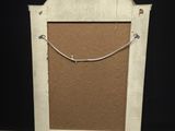 a picture of a picture frame with a cork board in it