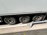 a truck that is parked on the side of the road