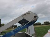 a crane that is sitting in the back of a truck