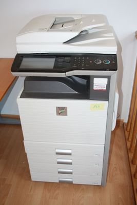 a printer that is sitting on top of a desk