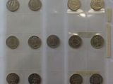 a lot of coins that are in a plastic bag