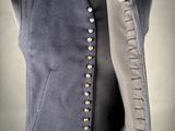 an image of a military vest with buttons on it