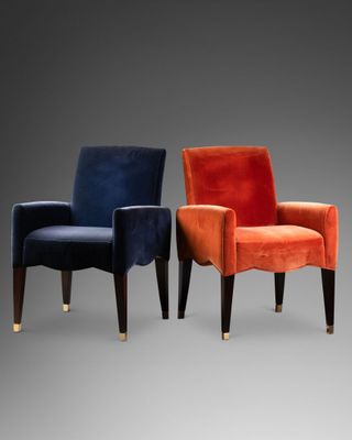 a set of three chairs with different colors of velvet