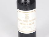 a bottle of wine that is sitting on a table
