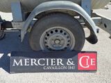 a sign that says mercier and c e on the side of a truck