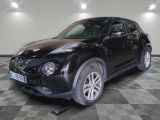 a picture of a black nissan juke suv parked in a garage