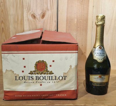a bottle of champagne and a bottle of wine on a table