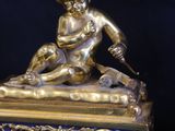 pair of antique bronze figurines of a boy and a dog