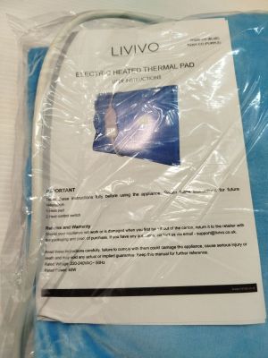 a bag of blue towels sitting on a table