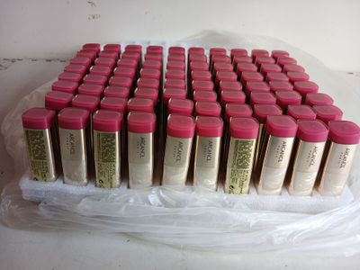 a lot of lipsticks that are on a plastic bag