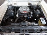 a picture of a car engine in the trunk of a car