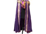 a close up of a purple and gold cloak on a mannequin