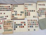 several different types of stamps are laid out on a sheet of paper