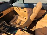 beige interior of a car with tan leather seats and dashboard