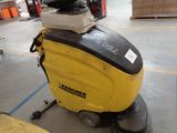 a machine that is sitting on the floor in a warehouse