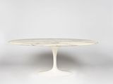 a white table with a marble top on a white background