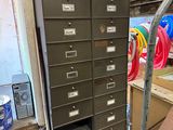 a lot of filing cabinets that are in a room