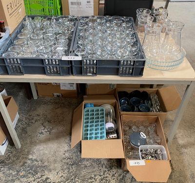 a table with a lot of glasses and bottles on it