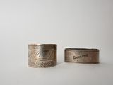 pair of antique silver napkin rings with engraved design