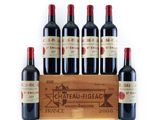 a group of six bottles of wine sitting on top of a wooden crate