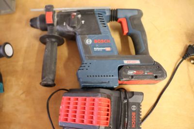 two tools that are sitting on a table