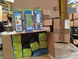 a pile of boxes sitting on top of a pallet in a warehouse
