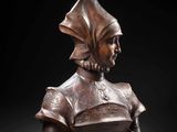 a bronze busturine of a man in armor