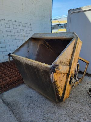 a large metal container sitting on the ground