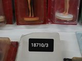 many figurines on display on the table