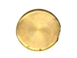 a close up of a gold coin on a white surface