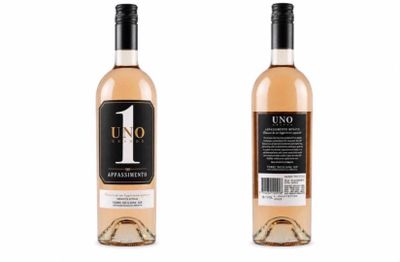 two bottles of wine are shown on a white background