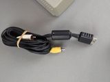 a cable that is connected to a charger on a table