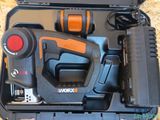 a tool in a case with a corded cord