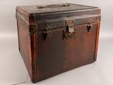 an old wooden trunk with metal latches on it