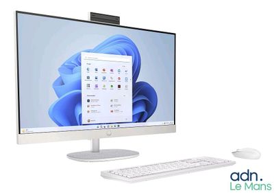 a desktop computer with a keyboard and mouse next to it