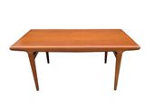 the table is made of teak and has a wooden top