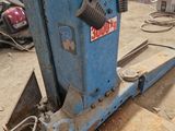 a machine that is sitting on a table in a garage