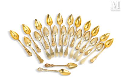 a lot of gold spoons and spoon spoons on a white background