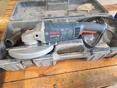 a tool in a tool box on a wooden table
