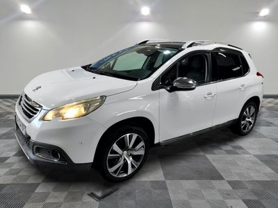 the white car is parked on a checkered tile floor