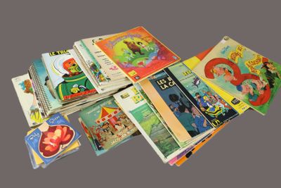 many children ' s books that are stacked on top of each other