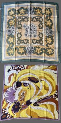 three different types of silk scarves are displayed on a gray surface