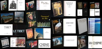 a lot of books that are on a black background
