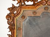 a mirror that is sitting on the wall