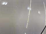 a close up of the hood of a car