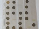 a close up of a bunch of coins on a table