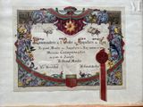 a picture of a certificate with a wax seal on it